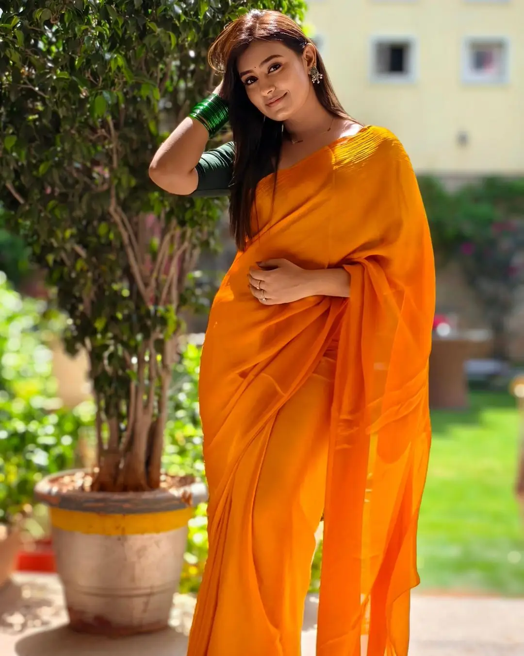 Telugu TV Actress Deepa Jagadeesh Stills In Orange Saree Green Blouse